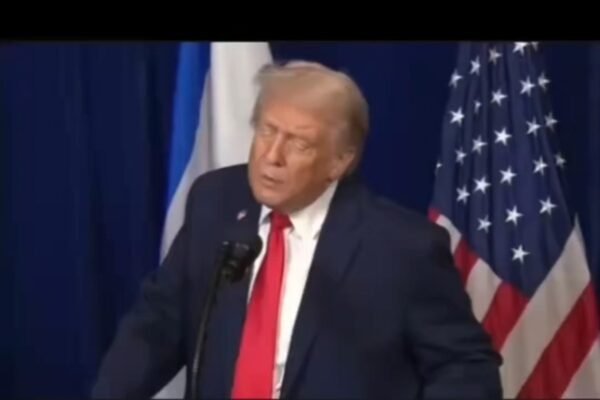 Donald Trump at a public event amid headlines questioning his political future